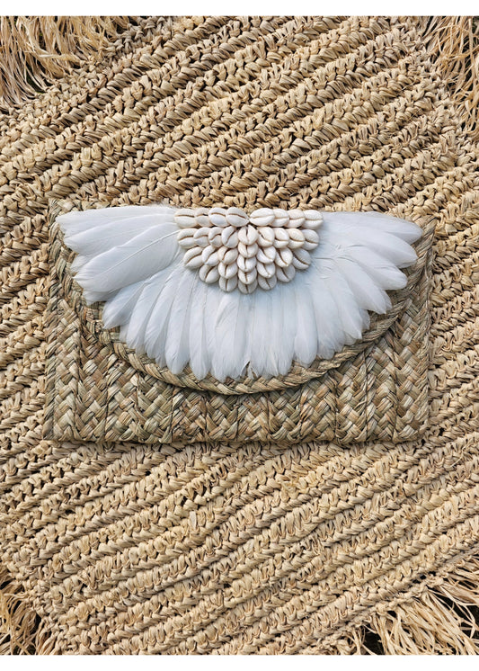 Faye Clutch feathers and cowrie shells